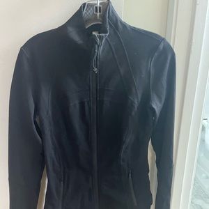Womens define jacket. Mock neck. Worn once washed once.